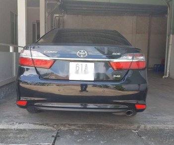 Toyota Camry 2016 - Cần bán lại xe Toyota Camry đời 2016, màu xanh đen