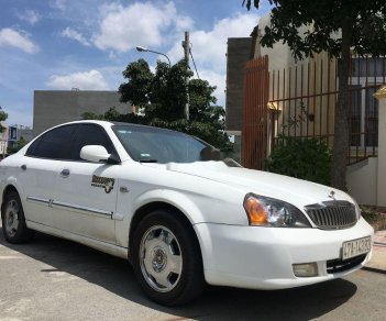 Daewoo Magnus 2004 - Bán Daewoo Magnus 2.5AT đời 2004, màu trắng, 125tr