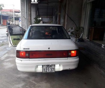 Mazda 323  MT 1996 - Bán ô tô Mazda 323 MT 1996, màu trắng