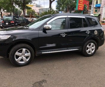 Hyundai Santa Fe  MT 2008 - Cần bán lại xe Hyundai Santa Fe MT đời 2008, màu đen