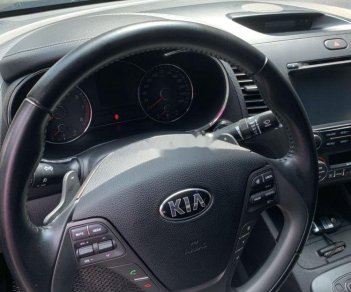 Kia K3 2014 - Cần bán xe Kia K3 năm 2014, màu vàng