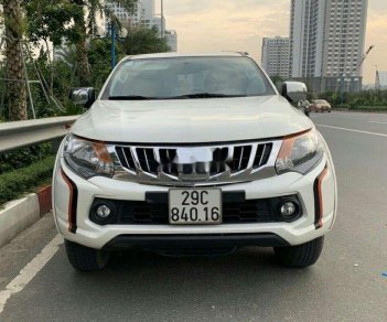 Mitsubishi Triton 2016 - Cần bán Mitsubishi Triton đời 2016, màu trắng, nhập khẩu nguyên chiếc số tự động