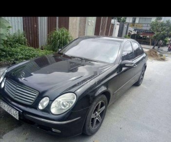 Mercedes-Benz E class 2002 - Bán Mercedes đời 2002, màu đen