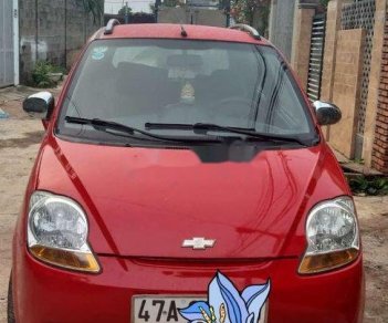 Chevrolet Spark 2009 - Gia đình lên 7 chỗ cần bán Chevrolet Spark đời 2009, màu đỏ, 125tr