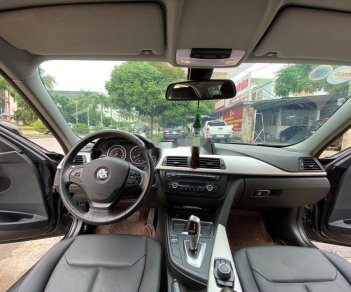 BMW 3 Series 2014 - Bán xe BMW 3 Series 320i đời 2014, màu đen