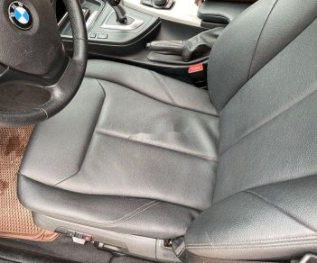 BMW 3 Series 2014 - Bán xe BMW 3 Series 320i đời 2014, màu đen