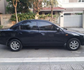 Mazda 323 2000 - Cần bán lại xe Mazda 323 đời 2000, màu đen, xe nhập, giá tốt