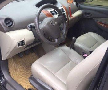 Toyota Vios 1.5 MT 2011 - Cần bán gấp Toyota Vios 1.5E năm sản xuất 2011, màu đen xe gia đình