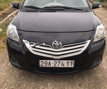 Toyota Vios 1.5 MT 2011 - Cần bán gấp Toyota Vios 1.5E năm sản xuất 2011, màu đen xe gia đình