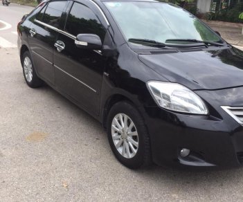 Toyota Vios 1.5 MT 2011 - Cần bán gấp Toyota Vios 1.5E năm sản xuất 2011, màu đen xe gia đình