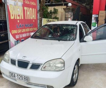 Daewoo Lacetti 2006 - Cần bán gấp Daewoo Lacetti đời 2006, màu trắng xe gia đình, giá 125tr, còn nguyên bản