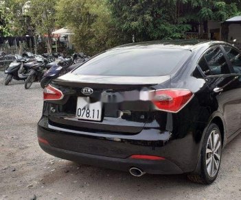 Kia K3    2014 - Cần bán Kia K3 năm sản xuất 2014, màu đen