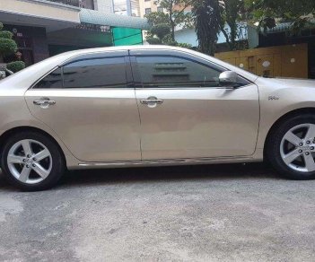 Toyota Camry   2014 - Bán Toyota Camry đời 2014, màu vàng, giá 850tr