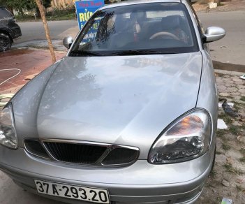 Daewoo Nubira 2002 - Cần bán Daewoo Nubira đời 2002, màu bạc máy gầm êm ru ốc mới tinh