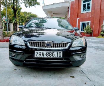 Ford Focus 2005 - Cần bán xe Ford Focus sản xuất năm 2005, màu đen xe nguyên bản