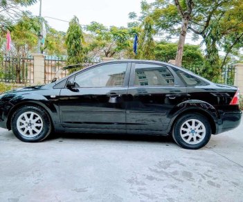 Ford Focus 2005 - Cần bán xe Ford Focus sản xuất năm 2005, màu đen xe nguyên bản