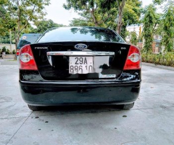 Ford Focus 2005 - Cần bán xe Ford Focus sản xuất năm 2005, màu đen xe nguyên bản