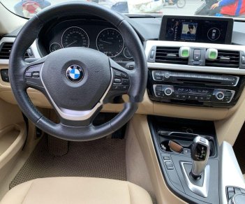 BMW 3 Series   2016 - Cần bán xe BMW 320i đời 2016, màu trắng, xe nhập