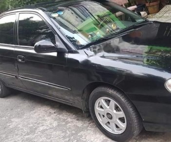 Kia Spectra   2003 - Bán xe Kia Spectra đời 2003, màu đen, nhập khẩu nguyên chiếc, giá 160tr