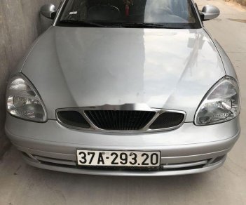 Daewoo Nubira 2002 - Cần bán Daewoo Nubira đời 2002, màu bạc máy gầm êm ru ốc mới tinh