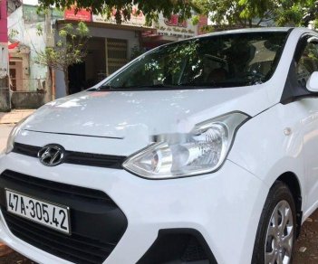 Hyundai Grand i10 2015 - Cần bán gấp Hyundai Grand i10 đời 2015, màu trắng, xe nhập xe gia đình