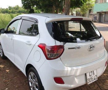 Hyundai Grand i10 2015 - Cần bán gấp Hyundai Grand i10 đời 2015, màu trắng, xe nhập xe gia đình