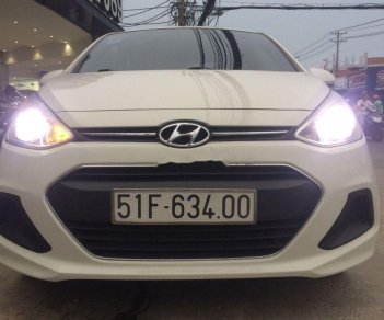 Hyundai Grand i10 2015 - Cần bán lại xe Hyundai Grand i10 sản xuất năm 2015, màu trắng, nhập khẩu như mới