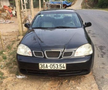 Daewoo Lacetti 2004 - Cần bán lại xe Daewoo Lacetti sản xuất năm 2004, màu đen