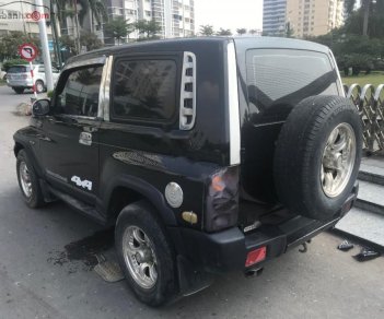 Ssangyong Korando 2004 - Cần bán lại xe Ssangyong Korando đời 2004, màu đen, nhập khẩu nguyên chiếc chính hãng