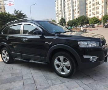 Chevrolet Captiva LT 2.4 MT 2013 - Bán Chevrolet Captiva LT 2.4 MT năm sản xuất 2013, màu đen số sàn