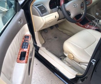 Toyota Camry 2.4G 2005 - Xe Toyota Camry 2.4MT 2005, màu đen số sàn