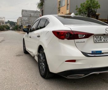 Mazda 3 1.5 AT 2017 - Cần bán gấp Mazda 3 1.5 AT năm sản xuất 2017, màu trắng