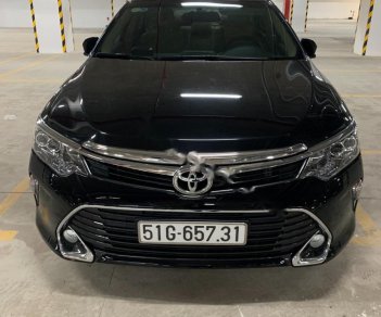 Toyota Camry 2018 - Cần bán lại xe Toyota Camry 2.0E năm 2018, màu đen xe nguyên bản