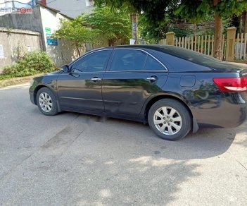 Toyota Camry 2.4G 2007 - Cần bán gấp Toyota Camry 2.4G sản xuất năm 2007, màu đen xe gia đình giá cạnh tranh