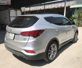 Hyundai Santa Fe 2017 - Bán xe Hyundai Santa Fe sản xuất 2017, màu bạc xe nguyên bản