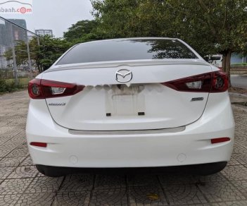 Mazda 3 1.5 AT 2016 - Cần bán lại xe Mazda 3 1.5 năm sản xuất 2016, màu trắng