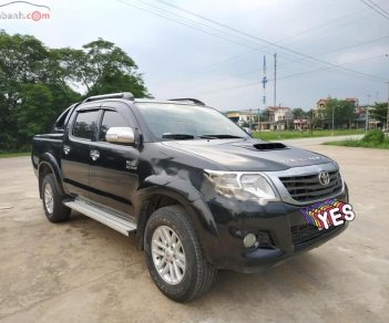 Toyota Hilux   2012 - Cần bán Toyota Hilux 3.0G 4x4 MT đời 2012, màu đen, nhập khẩu  