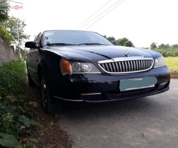 Daewoo Magnus 2.5 AT 2004 - Bán Daewoo Magnus 2.5 AT đời 2004, màu đen, giá chỉ 110 triệu