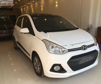 Hyundai Grand i10   1.2 AT 2014 - Cần bán lại xe Hyundai Grand i10 1.2 AT đời 2014, màu trắng, nhập khẩu nguyên chiếc