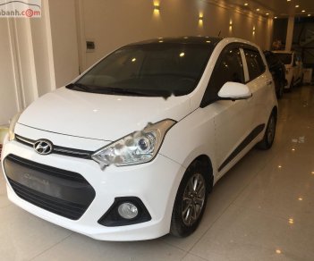 Hyundai Grand i10   1.2 AT 2014 - Cần bán lại xe Hyundai Grand i10 1.2 AT đời 2014, màu trắng, nhập khẩu nguyên chiếc