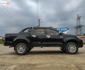 Toyota Hilux   2012 - Cần bán Toyota Hilux 3.0G 4x4 MT đời 2012, màu đen, nhập khẩu  