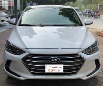 Hyundai Elantra 1.6 AT 2016 - Cần bán gấp Hyundai Elantra 1.6 AT 2016, màu trắng xe nguyên bản