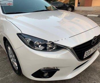 Mazda 3 2015 - Bán Mazda 3 sản xuất năm 2015, màu trắng, chính chủ, 565 triệu