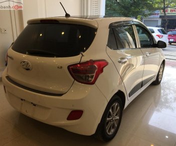 Hyundai Grand i10   1.2 AT 2014 - Cần bán lại xe Hyundai Grand i10 1.2 AT đời 2014, màu trắng, nhập khẩu nguyên chiếc