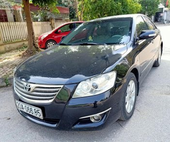 Toyota Camry 2.4G 2007 - Cần bán gấp Toyota Camry 2.4G sản xuất năm 2007, màu đen xe gia đình giá cạnh tranh