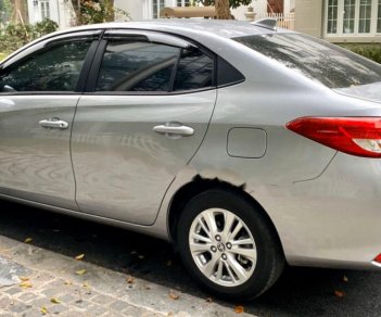 Toyota Vios E CVT 2018 - Cần bán lại xe Toyota Vios E CVT sản xuất 2018, màu bạc