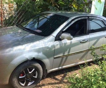 Daewoo Lacetti 2010 - Bán Daewoo Lacetti MT đời 2010, màu bạc số sàn