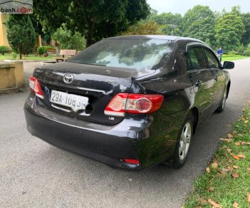 Toyota Corolla 2010 - Cần bán gấp Toyota Corolla XLi 1.6 năm 2010, màu đen, xe nhập