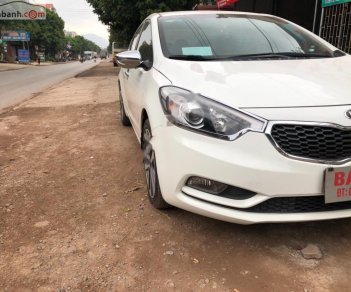 Kia K3 1.6 MT 2014 - Cần bán xe Kia K3 1.6 MT sản xuất năm 2014, màu trắng, giá 425tr