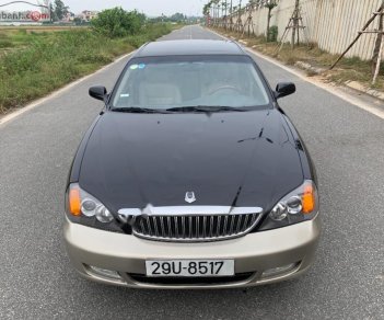 Daewoo Magnus   2004 - Bán xe cũ Daewoo Magnus 2.5 AT 2004, màu đen